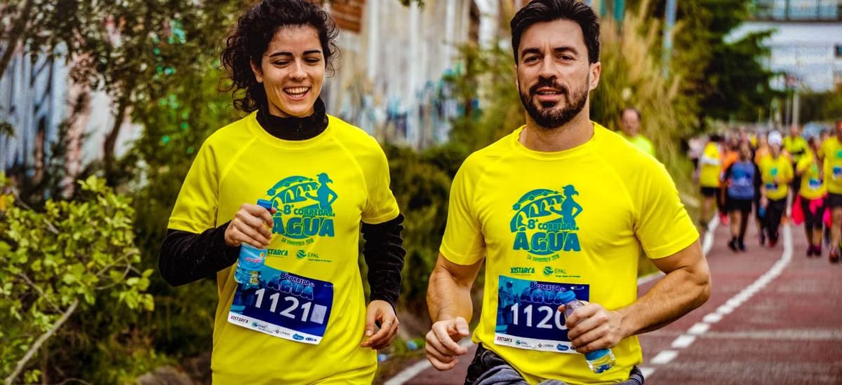 Two athletes participating in a marathon, showing determination and joy.